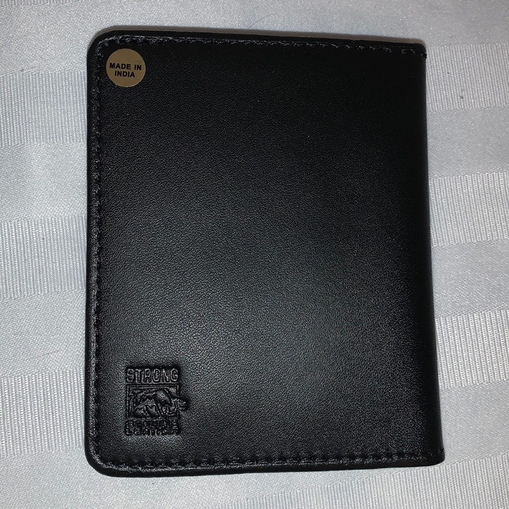 Flip out badge case with credit card slots. NWOT